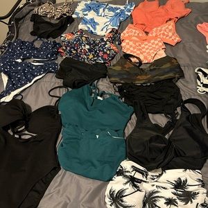 Lot of 10 swimsuits, Variety of brands.All are either L or XL.